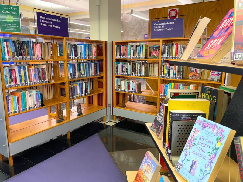 books on returned today shelves and display pyramid
